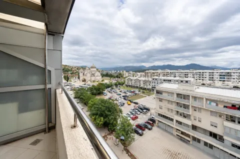 View of the city and church from the balcony. - image 7