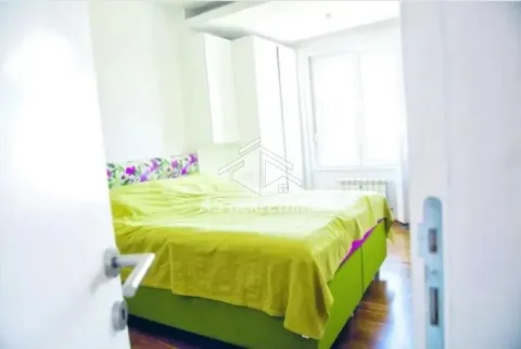 Bedroom with a double bed and a wardrobe. - image 9