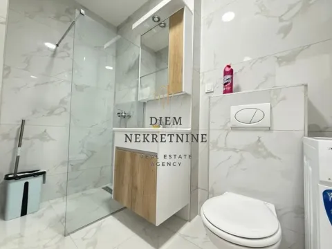 Rent, two bedroom apartment, 76m², Central Point, Podgorica - image 14