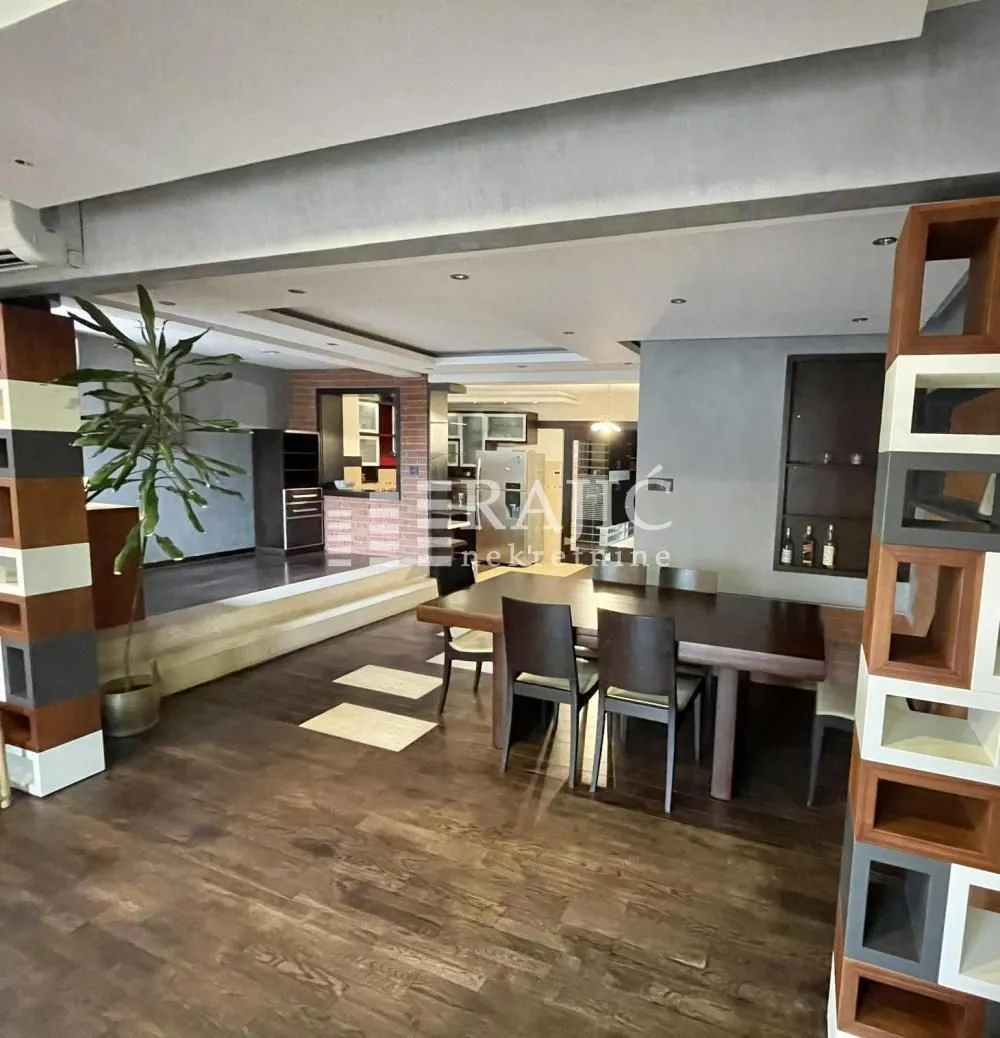 Spacious living room with dining area and modern interior.