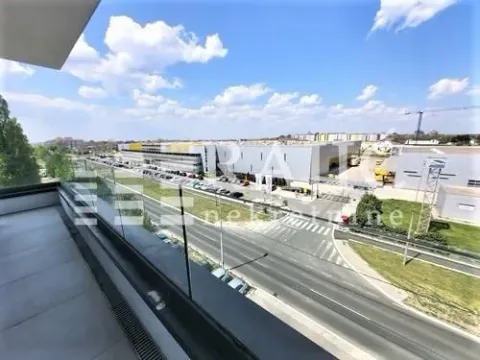View from the terrace overlooking the street and surrounding buildings. - image 2