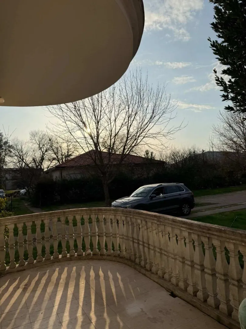View from a terrace overlooking the yard and surrounding area.