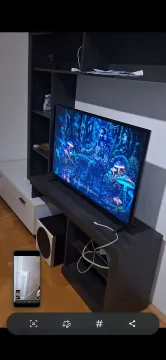 Dnevna soba sa TV komodom i televizorom. - image 11