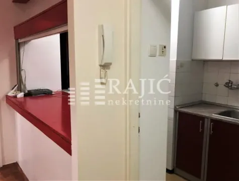 View of the kitchen and counter inside the apartment. - image 4