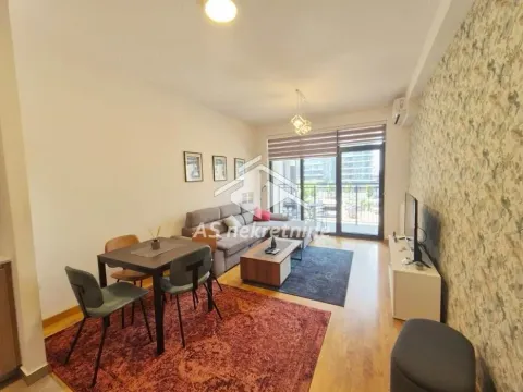 Living room with a dining area and access to the terrace. - image 3
