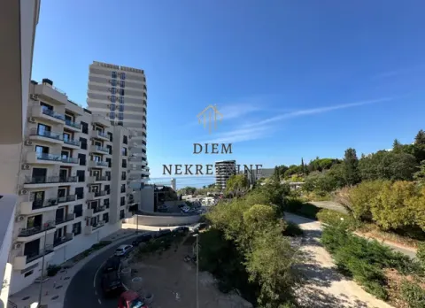 View from the terrace of surrounding buildings and greenery. - image 7
