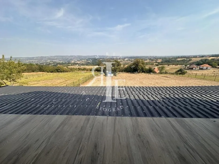 View of the surrounding landscape and greenery from the property terrace.