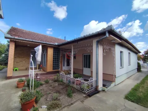 View of the exterior of the house with a landscaped yard and terrace. - image 2