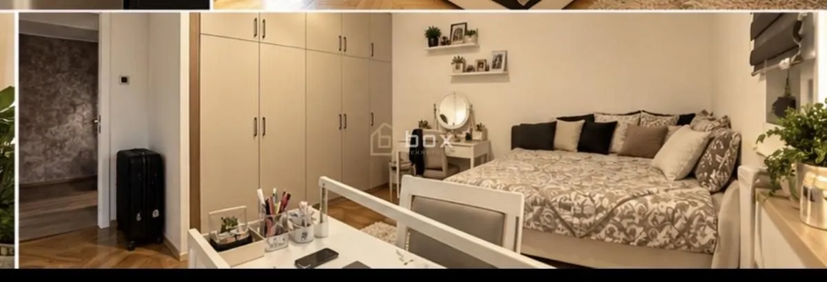 Nameštena spavaća soba sa bračnim krevetom, velikim plakarom i radnim stolom.
