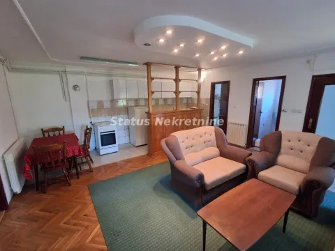 Living room connected to the dining area and kitchen. - image 2