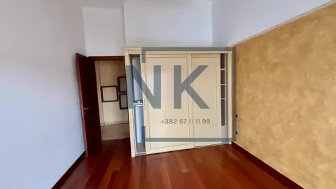 Bedroom with a fitted wardrobe and hardwood flooring. - image 12