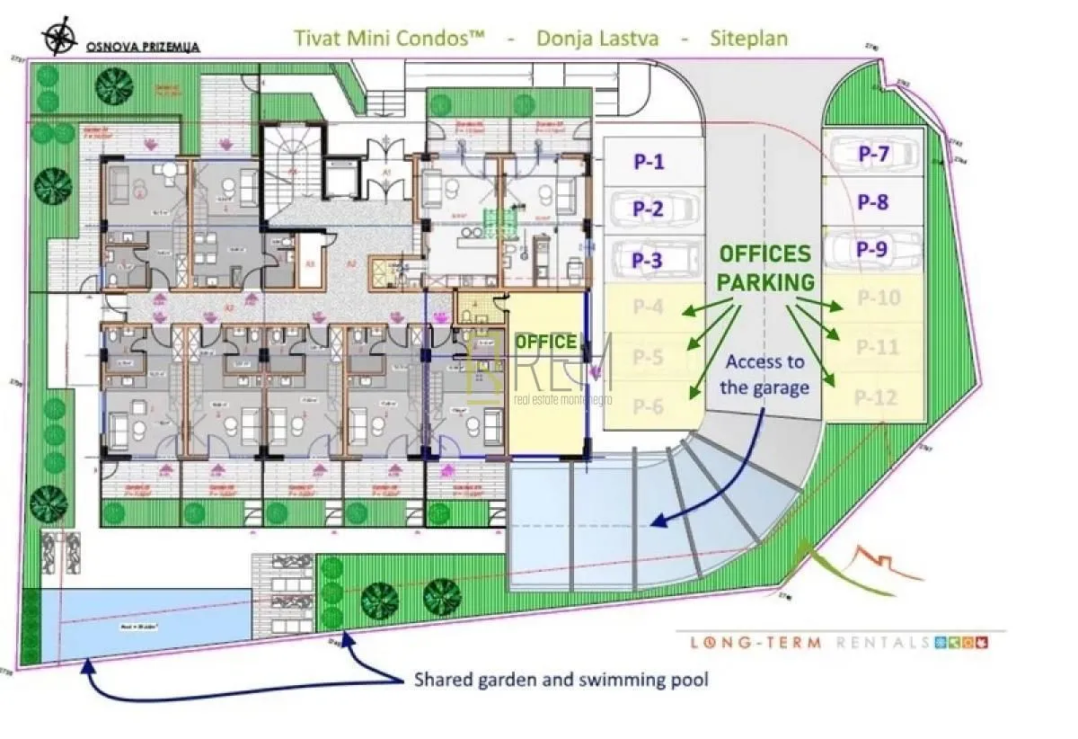 Architectural ground floor plan of the residential building with room layout and parking.