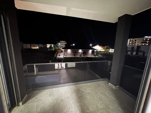 View from the terrace of surrounding buildings at night. - image 18