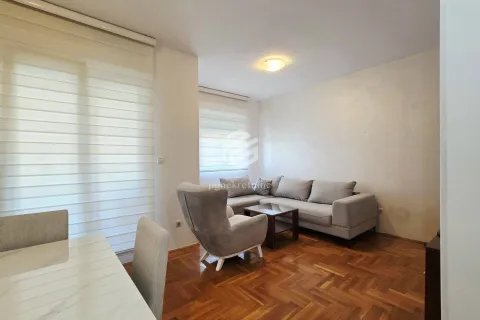Living room with a sofa set and a dining area. - image 5