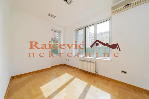 Empty room with parquet flooring and white walls. - image 11