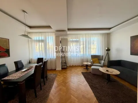 Spacious living room with a dining area and seating set. - image 2
