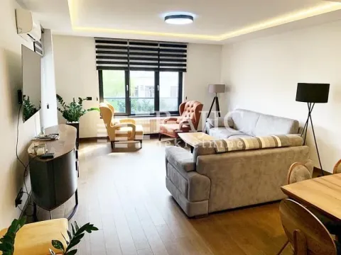 Spacious and bright living room with a sofa set and a dining table. - image 4