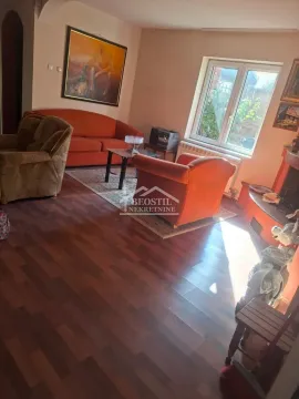 Living room with furniture, parquet flooring, and a window. - image 4
