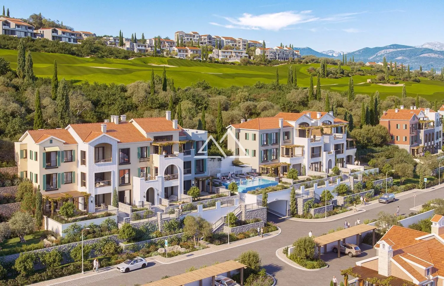 Pogled iz vazduha na stambeni kompleks sa bazenom i okruženjem.