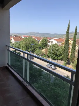 View from the balcony overlooking the neighborhood and surrounding hills. - image 18