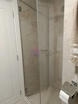 View of the shower cabin with a glass screen in the bathroom. - image 11