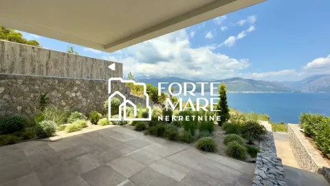 Covered terrace with a view of the sea and mountains. - image 4