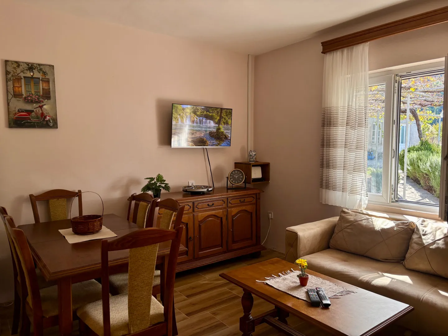 Living room with a dining area and seating set.