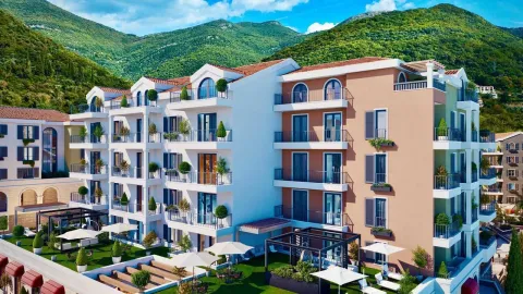 Eksterijer moderne stambene zgrade sa terasama i uređenim dvorištem u pozadini sa planinama. - image 11