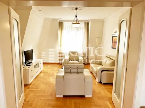Spacious living room with seating set and parquet flooring. - image 10