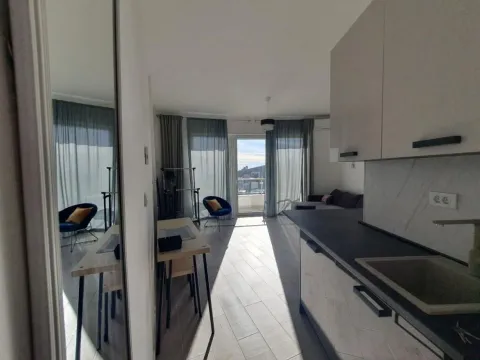 View from the kitchen towards the living room and terrace access. - image 3