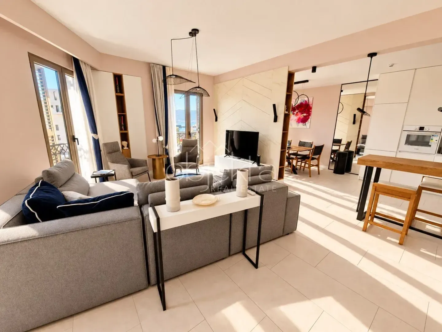 Spacious living room connected to the dining area and kitchen.