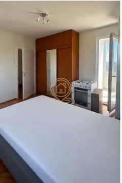 Furnished bedroom with a double bed, wardrobe, and access to the terrace. - image 3