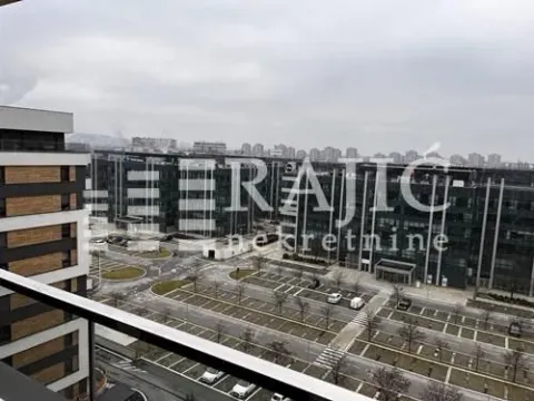 View from the terrace overlooking an urban neighborhood and office buildings. - image 10