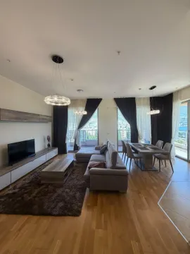 Spacious living room with a dining area and access to the terrace. - image 6