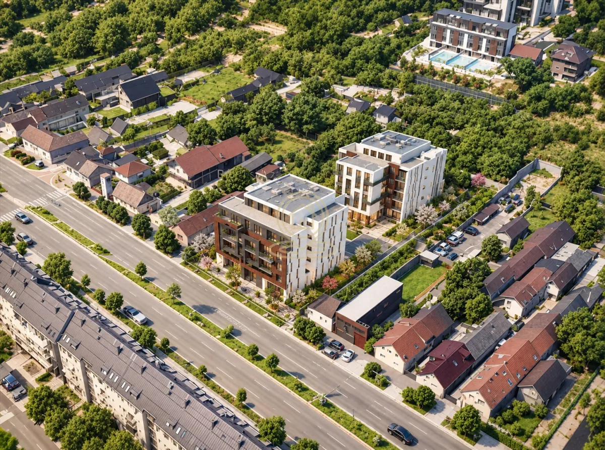 Aerial view of the residential complex with surrounding greenery and street.