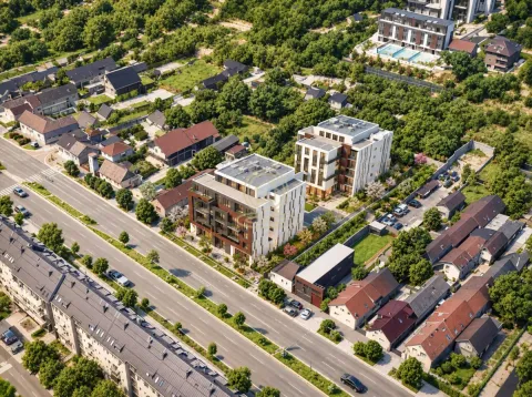 Aerial view of the residential complex with surrounding greenery and street. - image 6