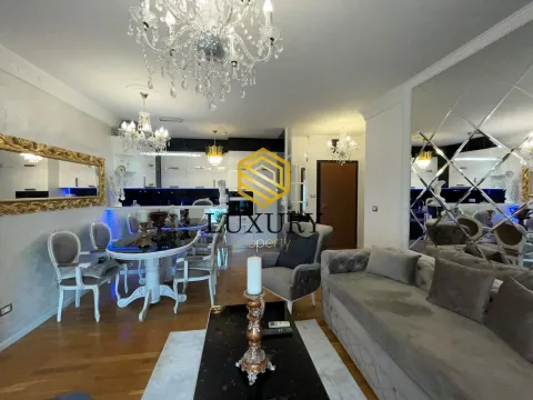 Spacious living room with dining area and modern furniture. - image 9
