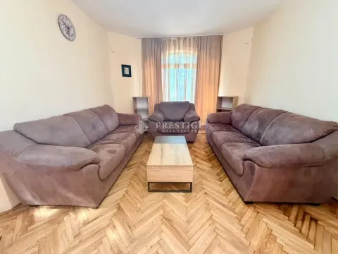 Spacious living room with seating set and parquet flooring. - image 4