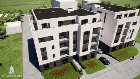 Pogled iz vazduha na moderne stambene zgrade sa uređenim dvorištem i parkingom. - image 6