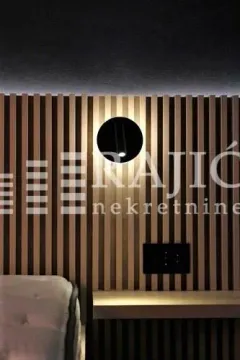 Modern bedroom interior with wooden wall panels and built-in lighting. - image 11