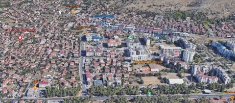 Pogled iz vazduha na širi dio grada i okolno naselje. - image 6