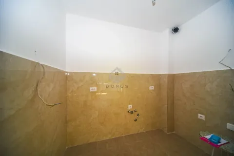 Empty room with ceramic tiles and wall installations. - image 4