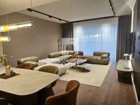 Modern living room with a sofa set, dining table, and large window. - image 2