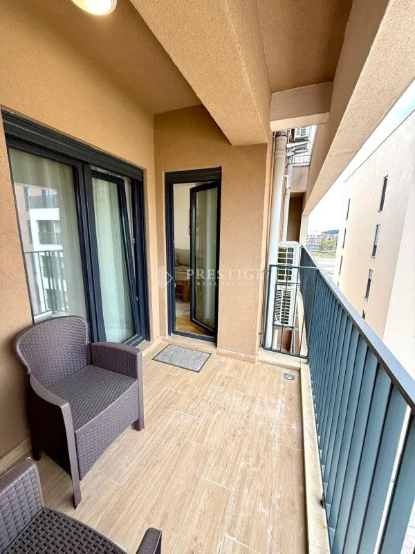 Furnished terrace with outdoor seating.