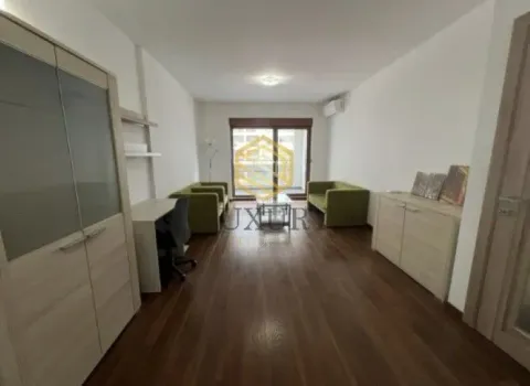 Living room with furniture, a desk, and access to the terrace. - image 5