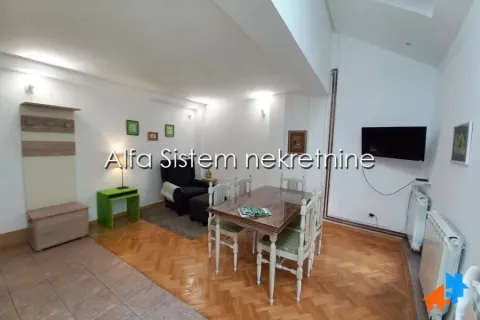 Living room with a dining table and chairs. - image 4