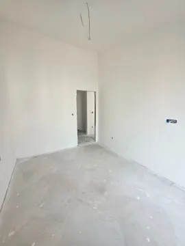 Empty room in a shell condition with painted walls. - image 10