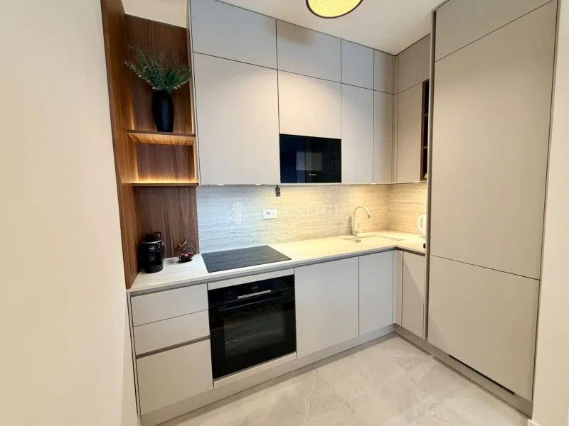 Modern kitchen with built-in units and appliances.