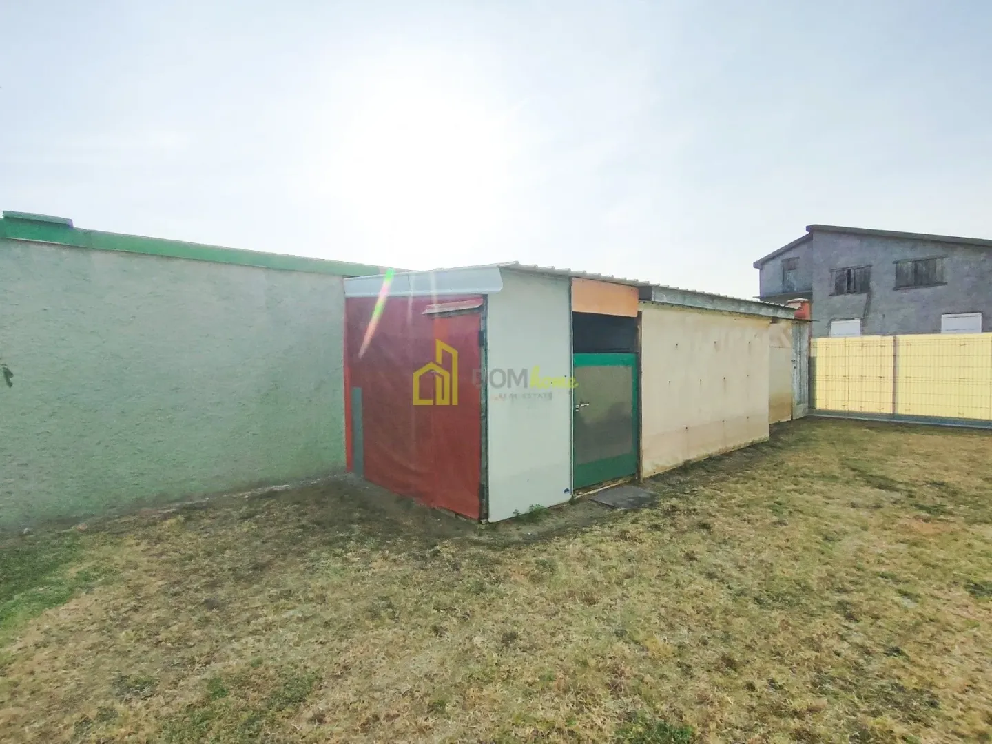 Outbuilding in the yard of the house.