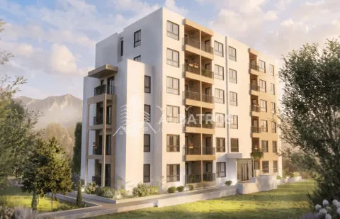 Exterior view of the residential building with balconies and landscaped surroundings. - image 4